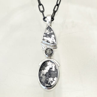Silver Ore, Rutilated Quartz, and Diamond Pendant